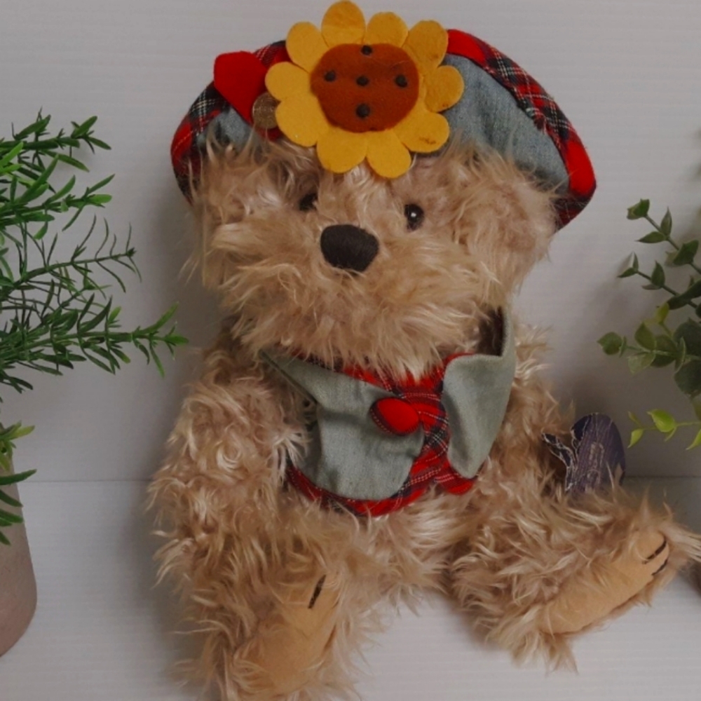 Introducing the Blossom Bear of Wealth from the Brass Button Collection, a rare